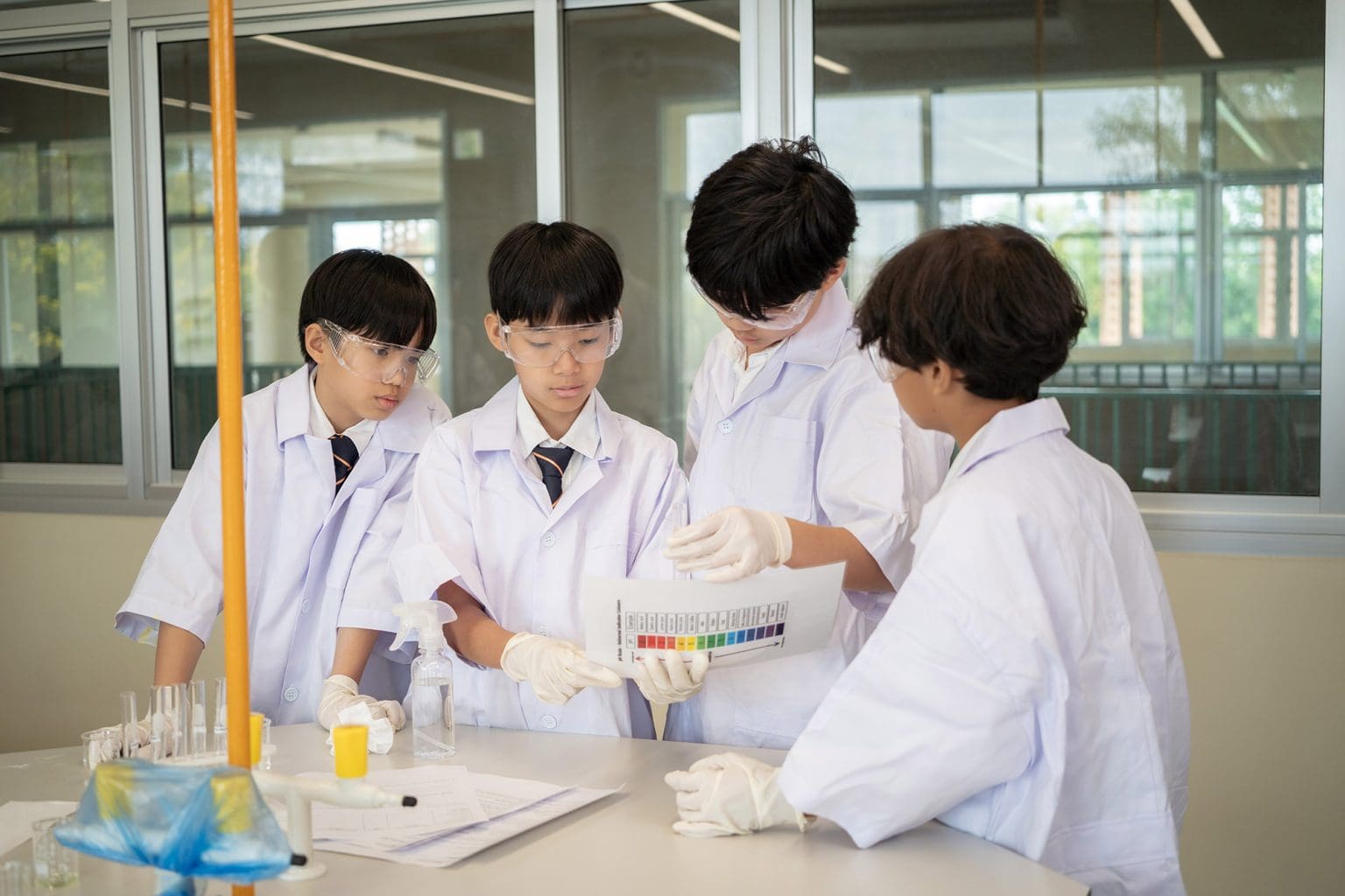 Students testing samples in the science lab