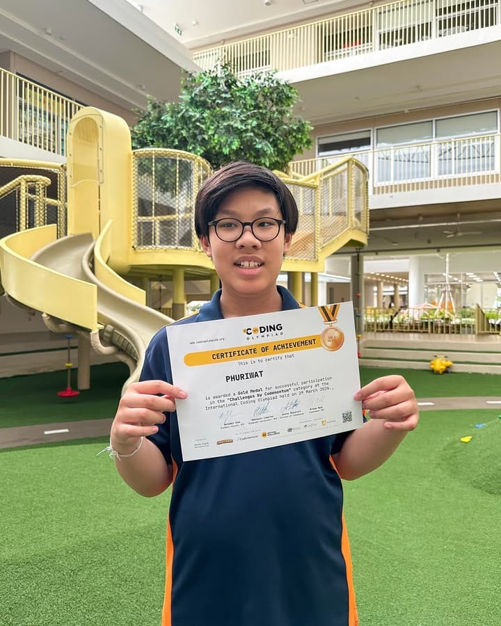Student Spotlight: Pooh Bear and Poby Celebrate Coding Olympiad Success photo 2