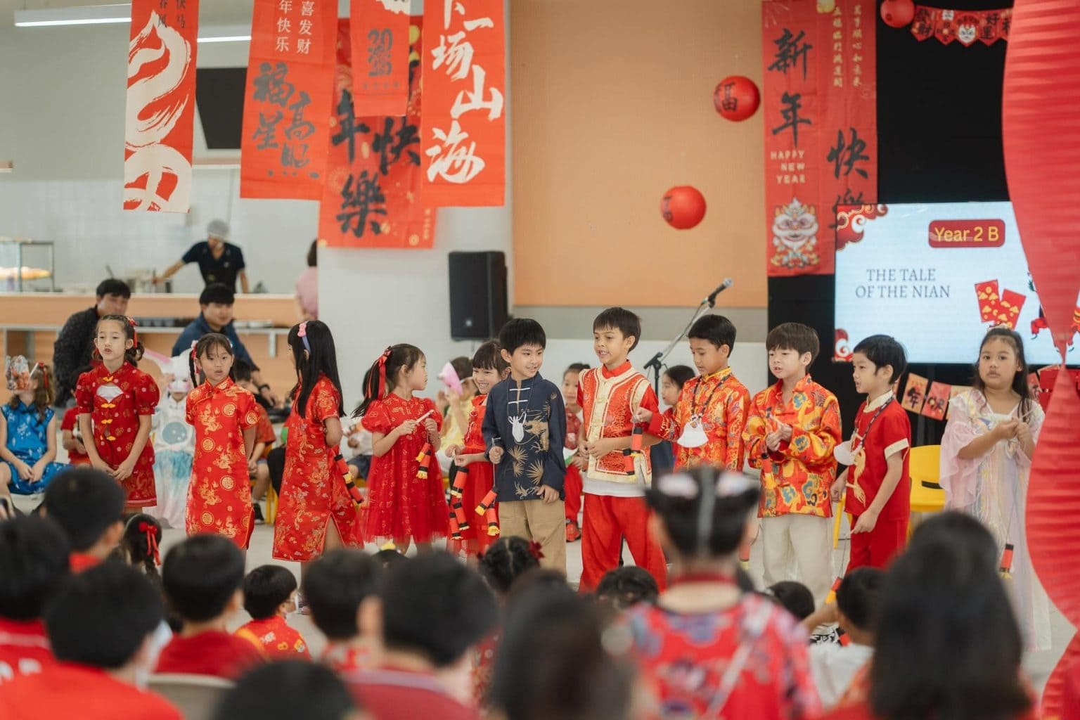 Year 2 pupils performing at the SBS Bangkok Lunar New Year celebration
